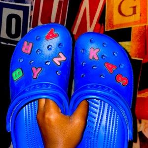 Dark blue crocs with gibbets included💙